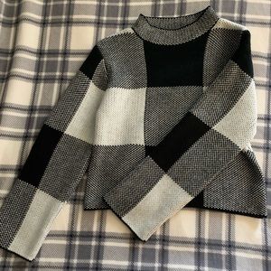 Cropped black and white sweater